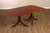 High Quality American Made Banded Rectangular Top Mahogany Dining Table on Carved Double Pedestal Base with Brass Capped...