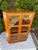 Vintage Danish teak corner display cabinet with glass door and 3 1/2 wood adjustable shelves inside. Perfect for a bar...