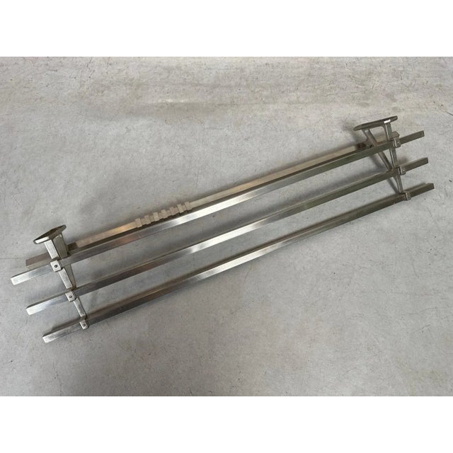 Original art deco coat rack with 7 hangers. Chrome-plated brass. Width: 100cm. Height: 14cm. Depth: 21cm. In beautiful...