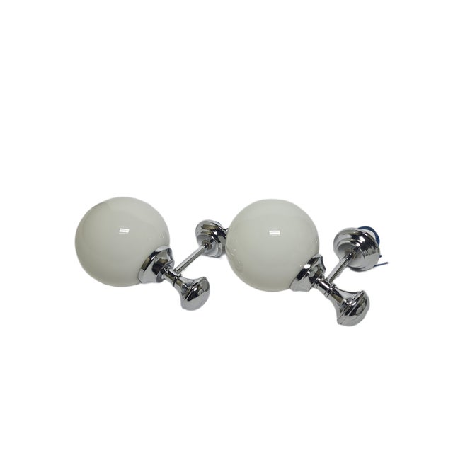 A pair of sconces from the 70s. They are preserved in good condition. European Plug (up to 250V).The wiring of this item...
