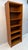 Classic Danish modern bookcase crafted in teak, featuring warm wood tones, beautiful natural grain, and clean, understated...