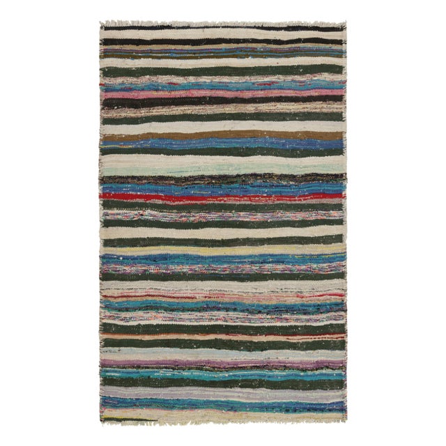 Made with handwoven wool circa 1950-1960, this 4x7 vintage Shahsavan Kilim is a particularly bright and sought-after work...