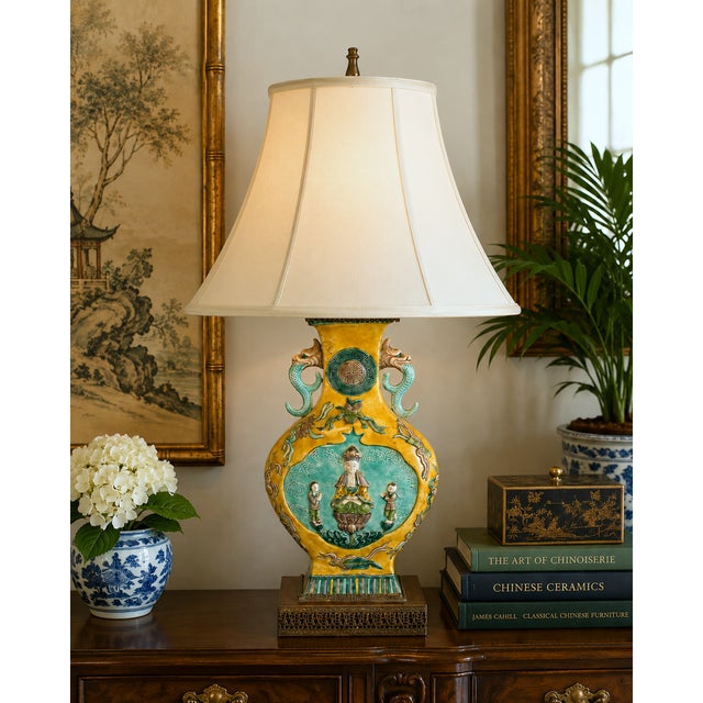 Vintage Chinese famille jaune porcelain table lamp featuring a mustard-yellow ground with turquoise, green and aubergine...
