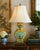 Vintage Chinese famille jaune porcelain table lamp featuring a mustard-yellow ground with turquoise, green and aubergine...
