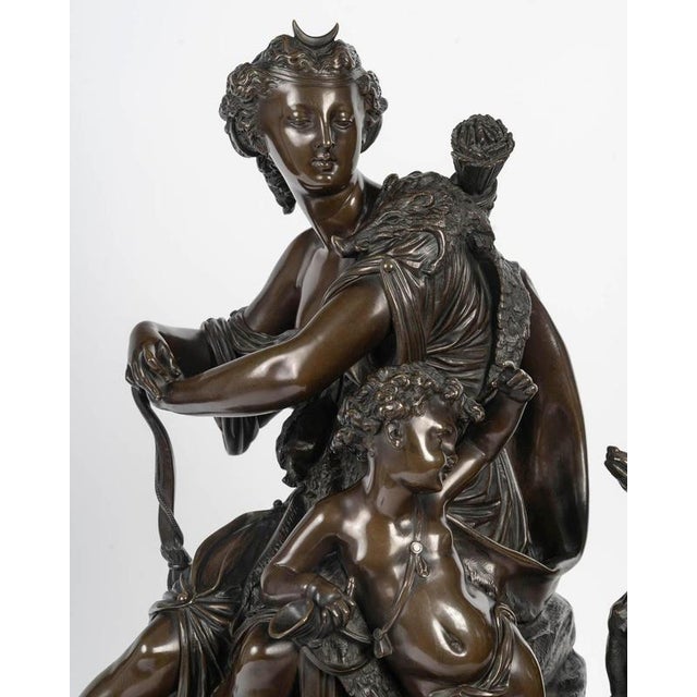 Large clock representing diana the huntress with a putto, 19th century, napoleon iii. 19th century clock, napoleon iii...