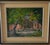 Original late 20th century oil painting on canvas. The piece depicts a courtyard or building entrance with leafy green...