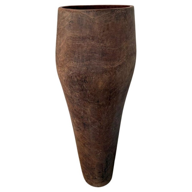 A stunningly beautiful sculptural container from Sumatra. Originally a drum. Hand carved out of a single piece of teak...