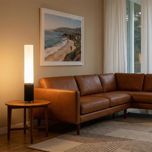 The Tambo Cylindro 29" Accent Table Lamp from NOVA of California is a masterclass in timeless form and tactile...