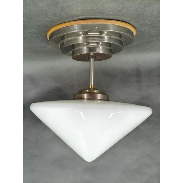 Rare art deco flush mount ceiling light produced in czechoslovakia during the 1930s. This refined modernist fixture...
