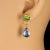 Exquisite Handmade Earrings with Green Peridot and Blue Kyanite in 14K Yellow Gold Elevate your jewelry collection with...