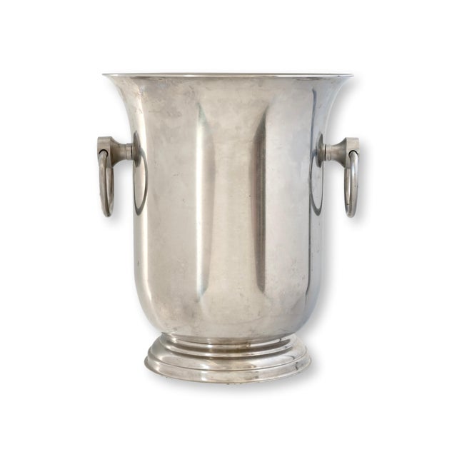 Vintage French Jean Couzon Orfèvre champagne bucket crafted in 18/8 stainless steel with classic ring side handles and a...