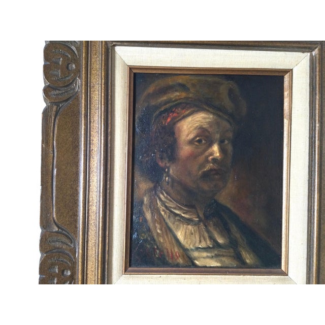 Oil painting of a medieval man with drop earing, signed on lower corner Costello. Original caved wood Frame. Circa 1950's....