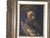 Oil painting of a medieval man with drop earing, signed on lower corner Costello. Original caved wood Frame. Circa 1950's....