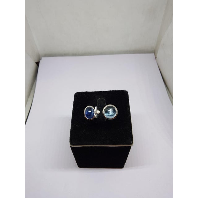 Gemstone details Gold Purity: 14K Solid Gold Blue sapphire: 3.30 cts Diamond: 0.02 cts Aquamarine: 4.30 cts 14K gold Gross...