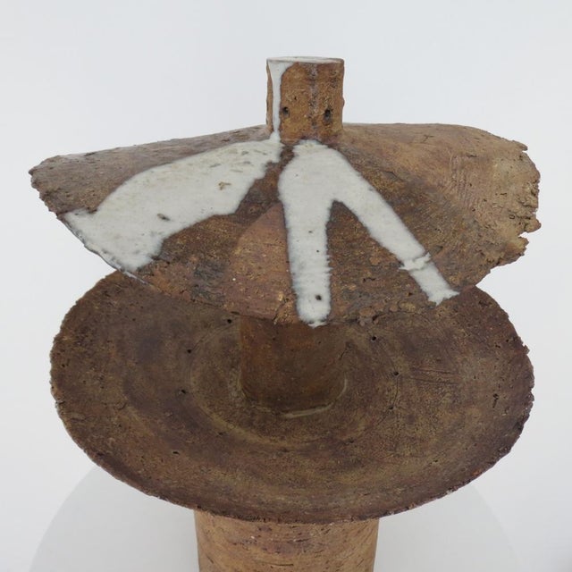 A large Japanese influenced Sculpture from the 1970s. Produced by hand using "grog" clay, giving the piece wonderful...