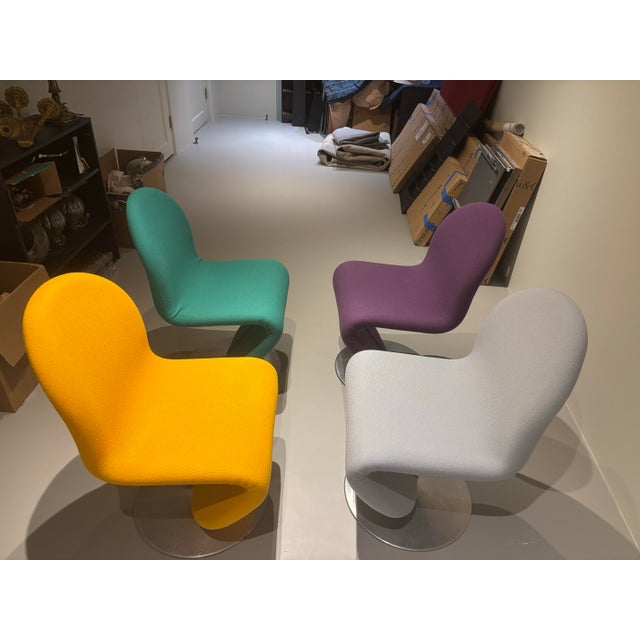 The chairs are attributed to the Danish designer and maker Verner Panton. S-shaped, swivel, fully upholstered in wool,...
