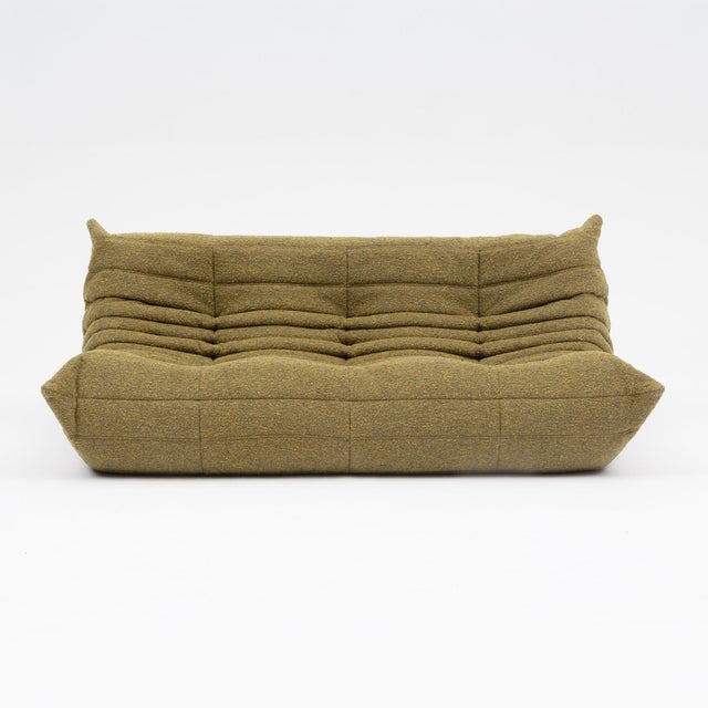 A vintage original Ligne Roset Togo three-seater designed by Michel Ducaroy in 1973 and sourced in Europe. Restored by our...