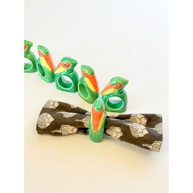 A charming set of vintage ceramic tropical bird napkin rings. A great way to bring some lively personality to your table...