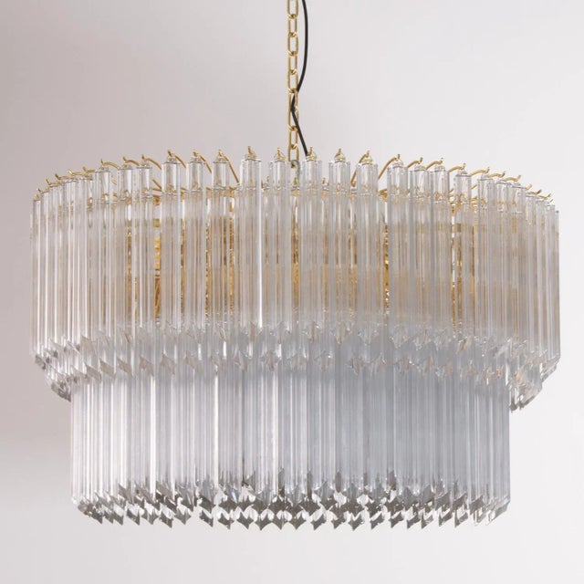 Large Chandelier in Brass E Quadrilobi in Transparent Glass Murano, 1980s, in Very Good conditions. Designed 1980 to 1989...