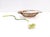Made in the UK by George Davidson, 1940s. This large oval bowl is made in sepia calcedony glass and features a rippled...