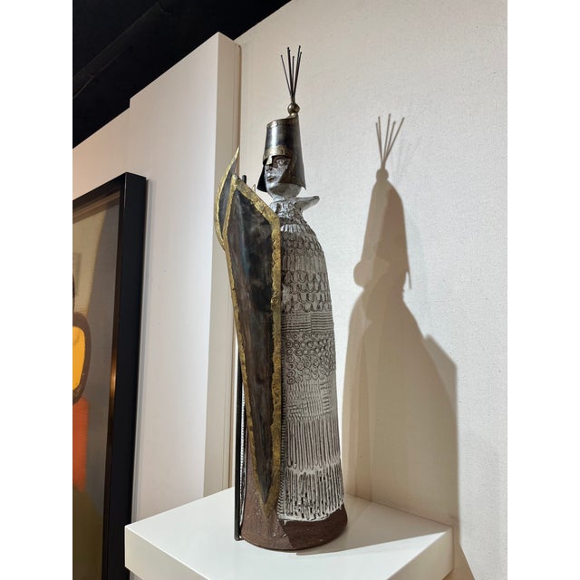 Extremely rare polychrome enameled ceramic sculpture representing a warrior armed with his weapons in sculpted and...