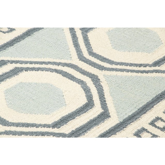 This vintage 2x3 Dhurrie flat weave is an exciting new entry in Rug & Kilim’s esteemed collection. Handwoven in cotton, it...