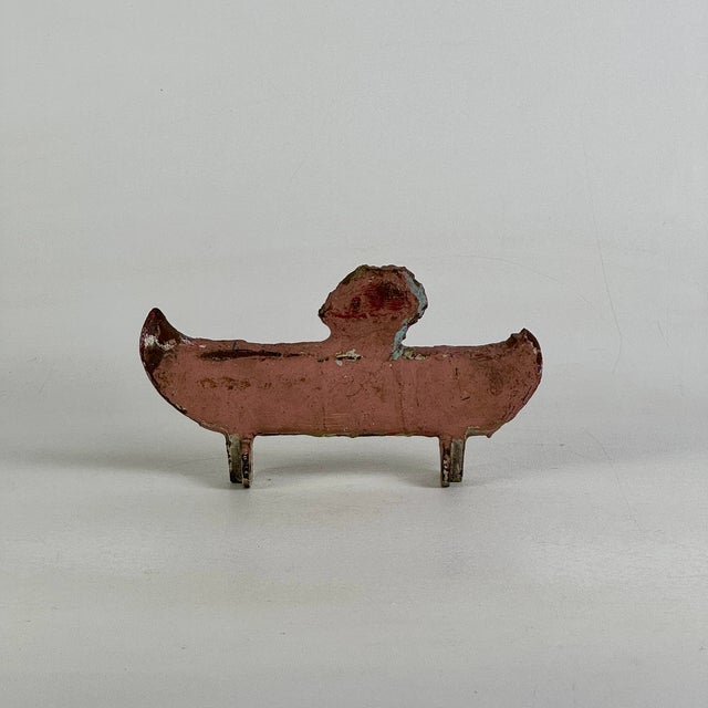 A rare to market early 20th Century William F. Mangels Co. for Coney Island cast iron Indian In Canoe shooting target....