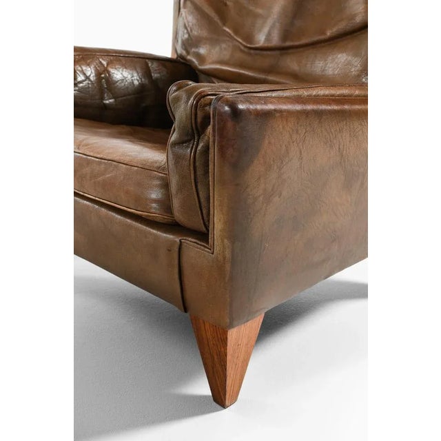 Wood Set of Lounge Chair and Stool in Rosewood and Brown Leather attributed to Illum Wikkelsø, 1960s For Sale - Image 7 of 11