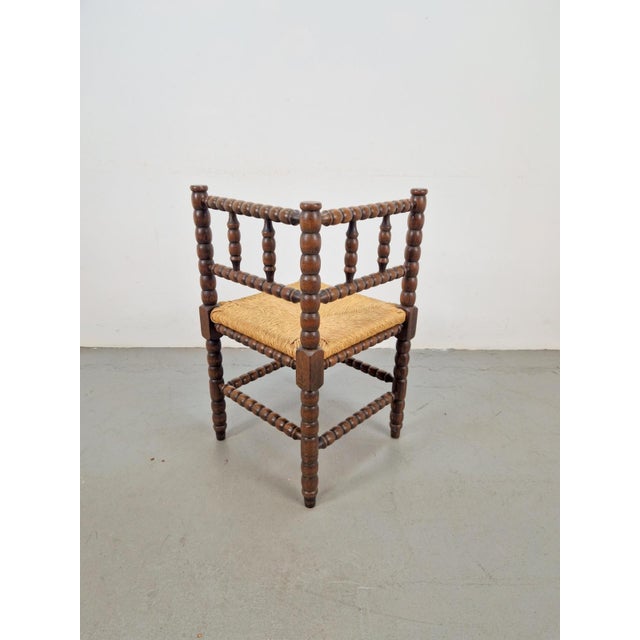 Vintage Bobbin oak wood corner chair rushes ’50 mid century 20th century oak bobbin turned wooden corner chair with rush...