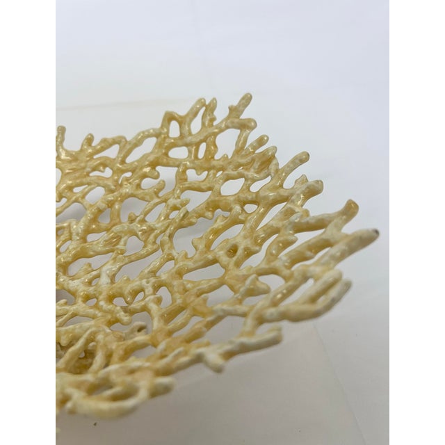 Bring a touch of coastal glamour to your décor with this unique vintage ceramic dish, beautifully crafted in an openwork...