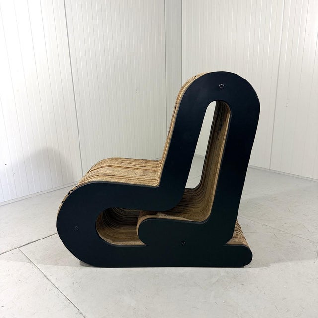 Special unique lounge chair in style of Frank Gehry. Made of cardboard and plywood. A real eyecatcher where you can sit...