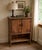 Handcrafted rustic wood cabinet by Cannon Woodworks, maker-marked and individually numbered No. 0087 on the back....