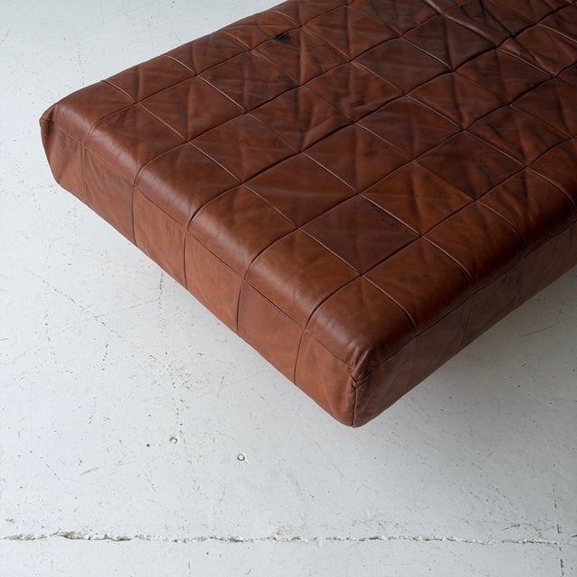 c. 1960s. Switzerland. Removeable headrest with patchwork leather construction.