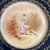 Truly an amazing find! Intricately handpainted Limoges cabinet plate in a background with a cobalt band encrusted with a...