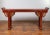 An antique Chinese Ming Dynasty style red lacquered altar console table from the 19th century, with everted flanges,...