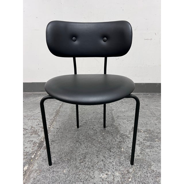 Design Plus Gallery presents the Coco Leather Side Chair by OEO Studio for Gubi. Black leather upholstery pairs with a...