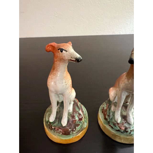 A Pair of Antique Staffordshire Decorated Whippets, Circa 1830's Made in England, circa 1830's Early form of a decorated...