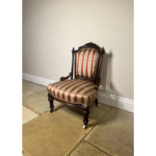 Stunning antique Victorian quality carved walnut ladies chair, having a quality carved walnut back with turned reeded...