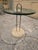 Timeless side table by Vico Magistretti. Elegant and sophisticated Hollywood Regency style with a beige/ tan travertine...