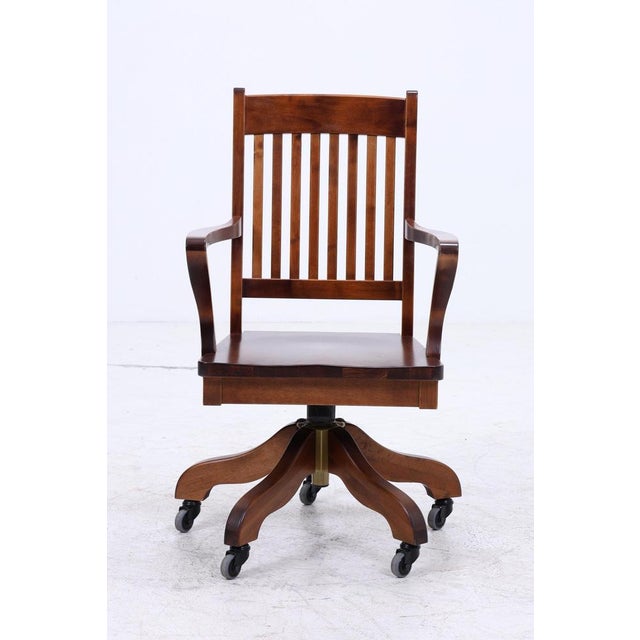 Beautiful antique desk chair with casters Dark-colored wooden frame • Swivel seat • Five-star base • Casters for easy...