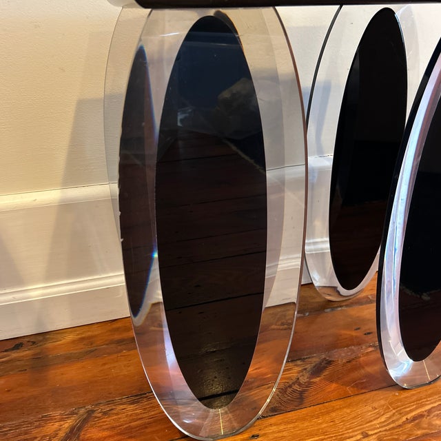 Gorgeous black and lucite side table signed by Loznikov and dated 1992. Top has some wear otherwise in good condition.