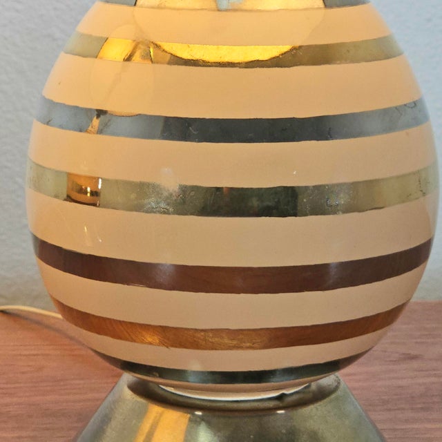 This matched pair of Wescal Manufacturing Company table lamps was produced in the United States circa 1958–1965. Executed...