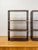 This handsome pair of Bombay Company campaign style freestanding shelves with brass trim are a practical and classically...