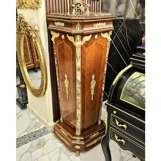 Make a sophisticated statement with this grand French Neoclassical-style pedestal stand, beautifully crafted with rich...