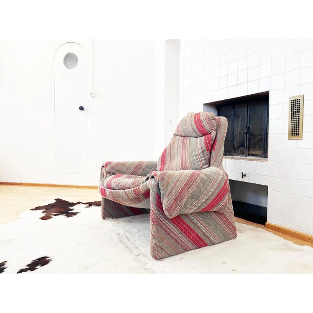 A stunning and exceptionally comfortable armchair set with a gorgeous original striped woven Saporiti designer textile and...