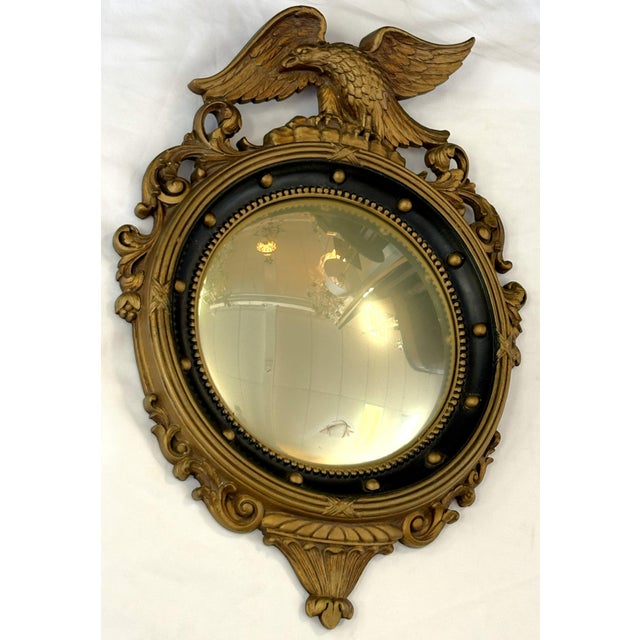 Awesome vintage Federal style wall mirror designed with the quintessential Federal details including an open winged eagle...