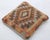 A one-of-a-kind handwoven Afghan wool kilim accent pillow featuring terracotta diamond medallion. Cut and sewn by hand...