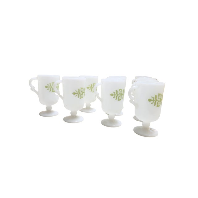 Raise a toast to retro charm with this complete set of ten Glasbake Irish coffee mugs, crafted in classic white milk glass...