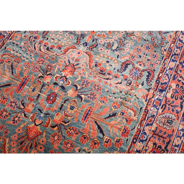 an early 20th Century Persian Sarouk Intermediate Rug with a rich emerald green field Details rug no. j3696 size 5' 11" x...
