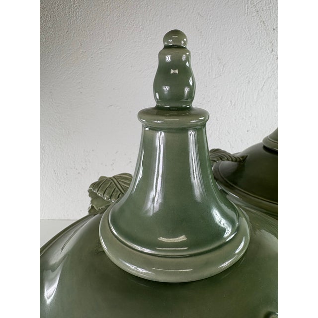 This is a large pair of sage green pottery urns handmade in Italy. These handmade pottery urns have a beautiful sage green...